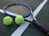 Tennis Racket and Two Tennis Balls